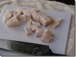 Fish is awfully easy to cut when it's frozen.  These tilapia also come in those little single-use packs that I so abhor for chicken breasts, but they don't seem to bug me for fish.